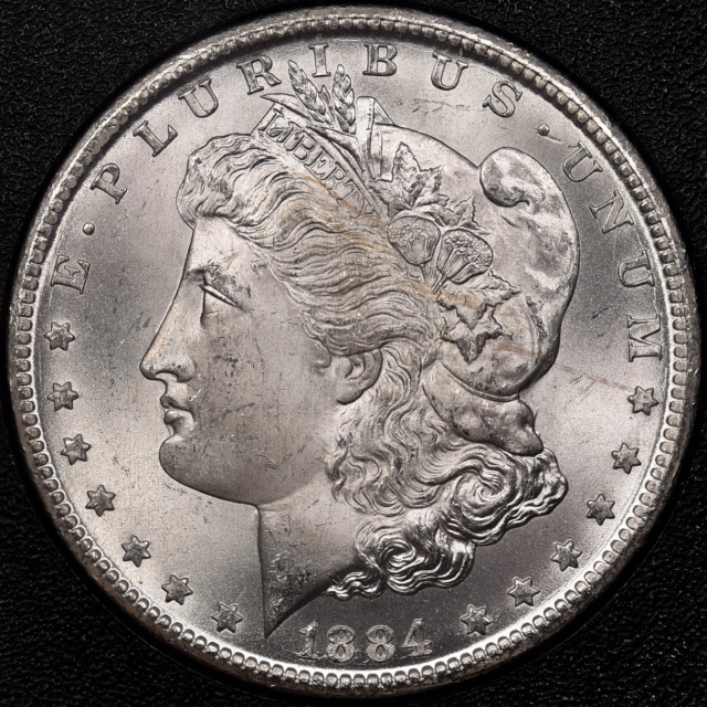 1884-CC GSA Hardpack Morgan Dollar NGC MS64+